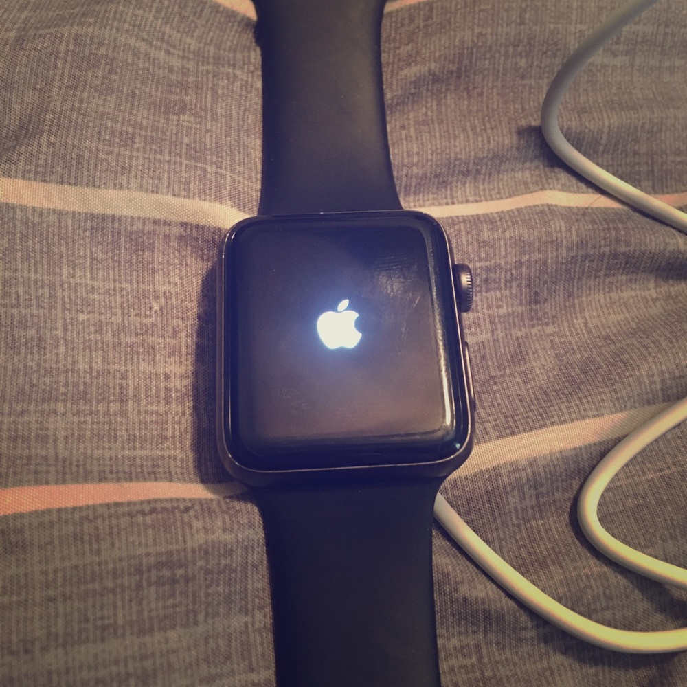 Black and gray apple watch series 2